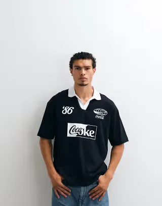 ASOS DESIGN oversized polo with Coca Cola print in Black