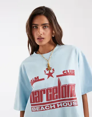 ASOS DESIGN boxy crop T-shirt with Barcelona graphic in baby blue