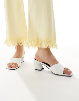 RAID Wide Fit Saanvi block heel mules in white