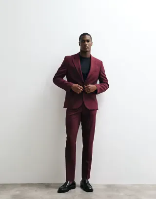 ASOS DESIGN FlexMax™ skinny suit jacket in burgundy