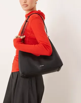 Calvin Klein top zip pebble shoulder bag with silver chain and strap in black