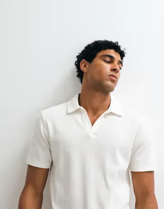 ASOS DESIGN regular fit camp collar polo shirt in cream waffle knit