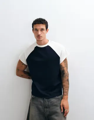 ASOS DESIGN boxy oversized raglan T-shirt with cap sleeve in navy and white