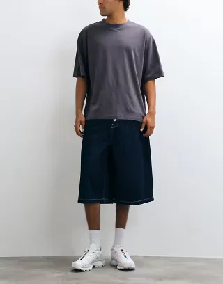 Reclaimed Vintage denim jort with stitching in indigo
