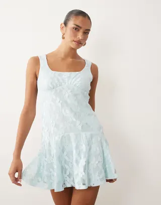 ASOS DESIGN lace mini dress with flippy hem in baby blue