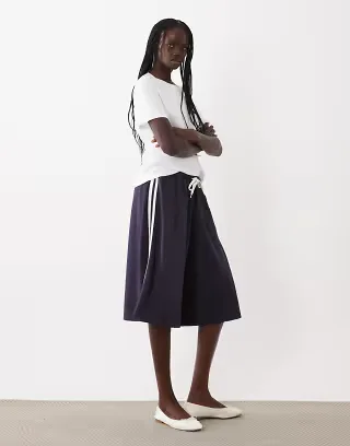 ASOS DESIGN oversized shorts with side stripe in navy