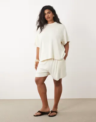 ASOS DESIGN Curve textured knit oversized T-shirt and runner shorts set in cream