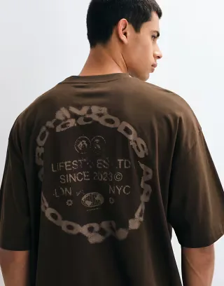 ASOS DESIGN oversized T-shirt with text graphic in brown