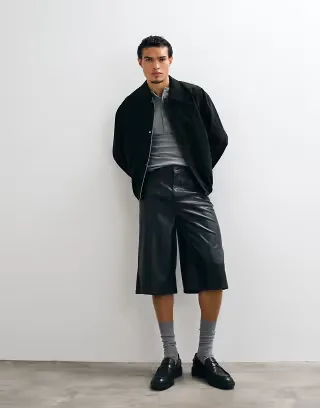 ASOS DESIGN longer length jorts in black faux leather