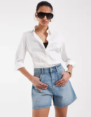 ASOS DESIGN denim dad shorts in mid blue