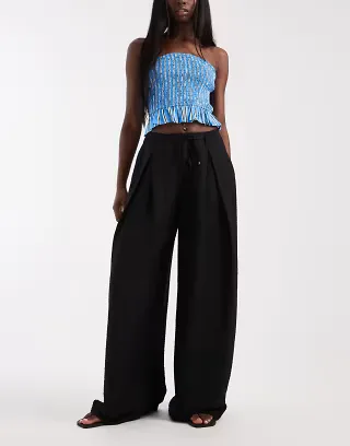 ASOS DESIGN textured wide leg pants with tie waist in black