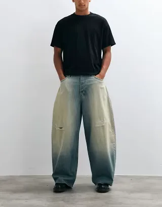 Weekday wide leg baggy jeans with drop crotch and distressed detail in faded blue