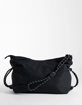 ASOS DESIGN nylon slouchy sling crossbody bag in black