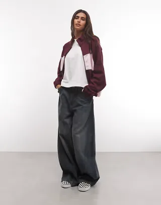 ASOS DESIGN panelled sweat track jacket in pink and burgundy
