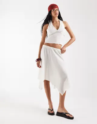 Reclaimed Vintage hanky hem skirt with pearl buttons in cream