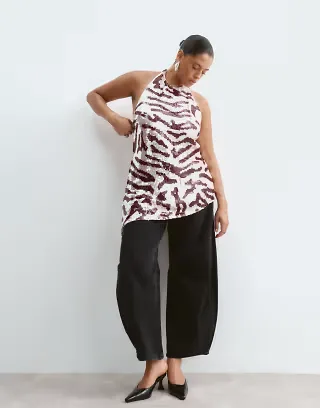 ARRANGE Curve sequin embellished asymmetric halter top in pink animal print