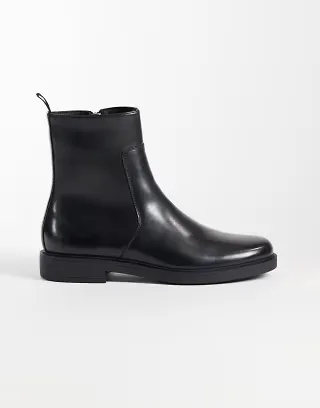 ASOS DESIGN zip up boots with seam detail in black