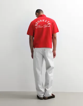 ASOS DESIGN relaxed knit notch neck with graphic in red