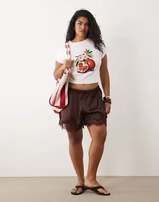 ASOS DESIGN Curve satin lace trim drawstring waist shorts in brown