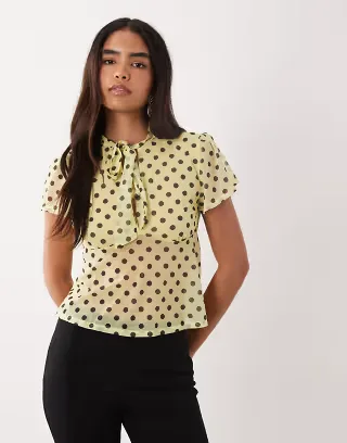 ASOS DESIGN short sleeve top with keyhole detail in yellow spot