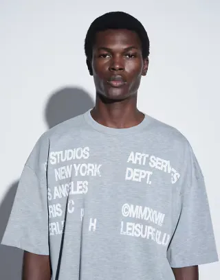 ASOS DESIGN boxy oversized drop shoulder t-shirt with text graphic in gray heather
