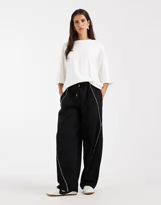 ASOS DESIGN Wide leg jogger with piping detail in black
