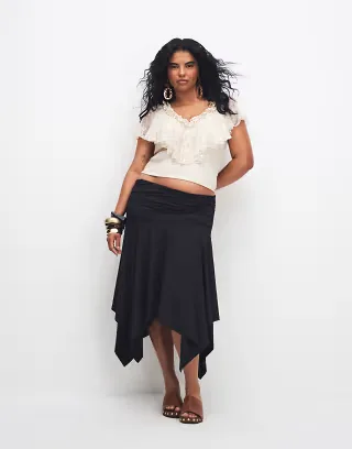 ASOS DESIGN Curve slinky hanky hem skirt in black