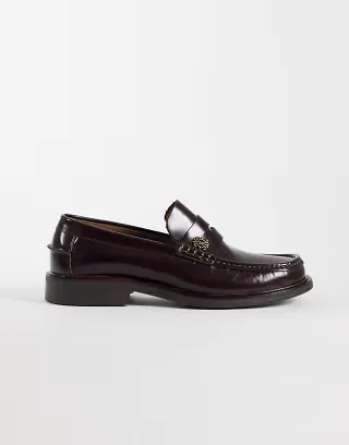 NOAK made in Portugal penny loafers with branded metal hardware in brown leather