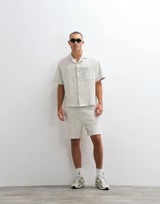 ASOS DESIGN mid length textured shorts in ecru