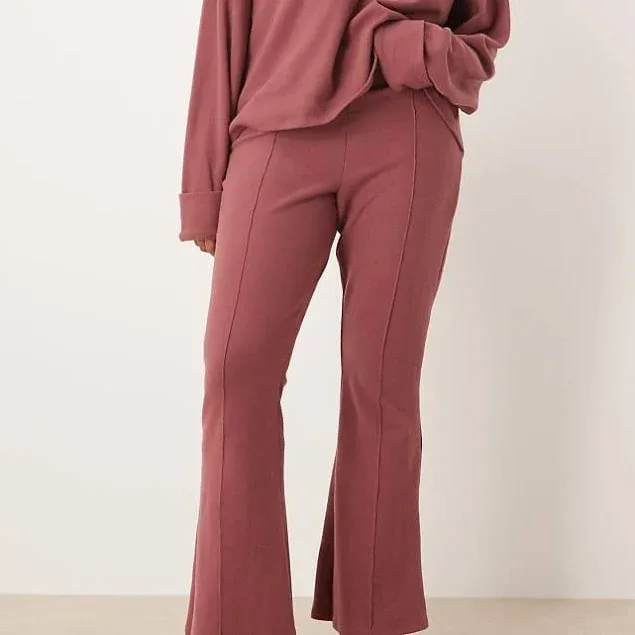 ASOS DESIGN Curve Supersoft seam detail kick flare pants in dark rose-Brown