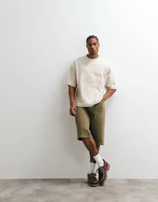 ASOS DESIGN heavyweight boxy oversized T-shirt with soccer chest embroidery in beige texture