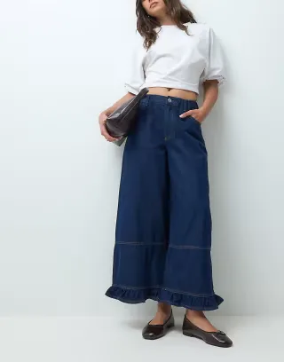 Miss Selfridge wide leg frill hem jean in raw wash