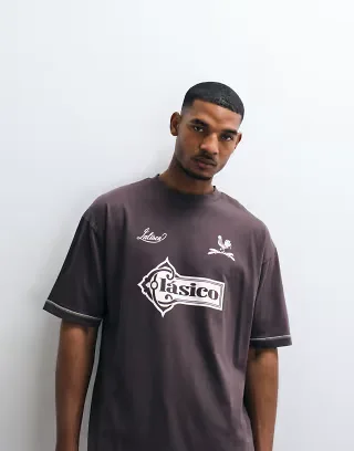 ASOS DESIGN heavyweight oversized T-shirt with stitch detail and football graphic in brown