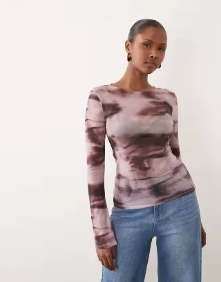 ASOS DESIGN sheer mesh flare long sleeve top in pink abstract