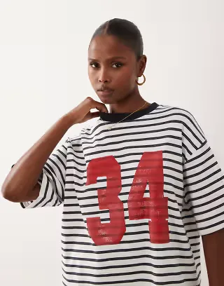 ASOS DESIGN oversized t-shirt with 34 varsity contrast graphic in navy stripes