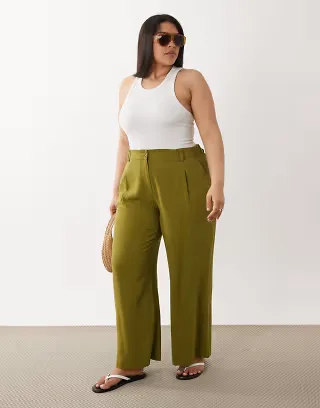 ASOS DESIGN Curve relaxed straight leg pants with linen in green
