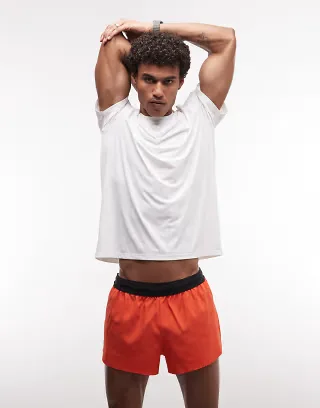 4505 2-inch running shorts with elastic waistband and zip pockets in tomato