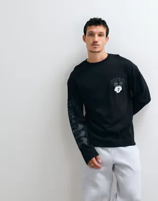 ASOS DESIGN Disney Halloween oversized long sleeve t-shirt with Mickey print in Black