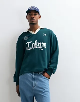 ASOS DESIGN oversized polo shirt with tipped collar pigment print and stepped hem in green