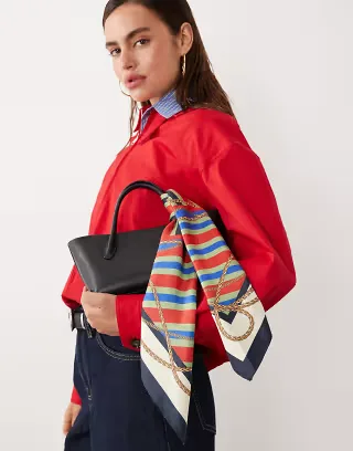 Mango featuring Hailey Bieber bag scarf in red and blue stripe print