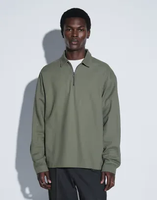 ASOS DESIGN oversized rugby shirt with zip in khaki