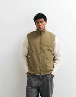 ASOS DESIGN borg lined vest in khaki
