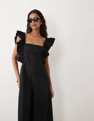 ASOS DESIGN pinafore jumpsuit with ruffles in black