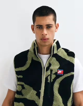 Nike Club zip-up fleece vest in khaki and black print