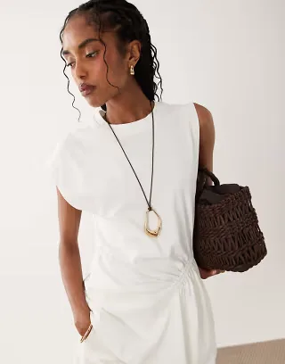 ASOS DESIGN long corded necklace with abstract pendant in gold