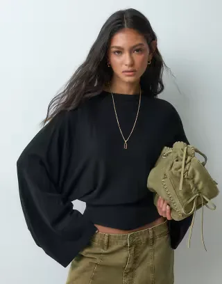 ASOS DESIGN knitted batwing waisted long sleeve top in black