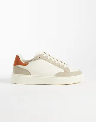 ASOS DESIGN lace-up sneakers with orange heel notch