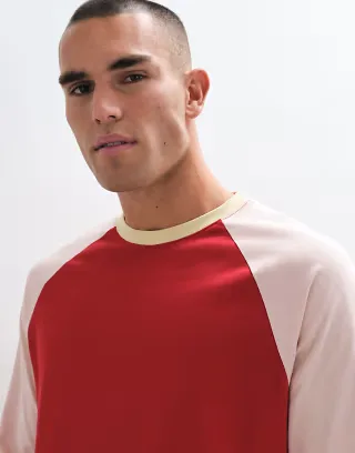 ASOS DESIGN heavyweight relaxed long sleeve raglan T-shirt in red and pink