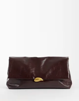 ASOS DESIGN oversized clutch in burgundy with hardware detail