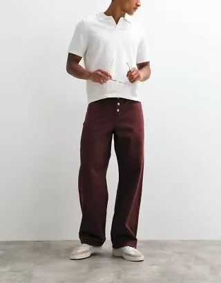 ASOS DESIGN baggy pants with exposed buttons in brown